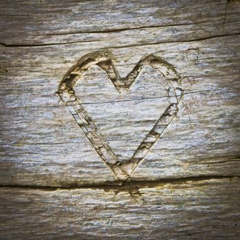 Heart shape carved into wood