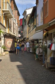 Street in the old part of the village of Garda, a comune on the shore of Lake Garda, in the province of Verona, region of Veneto, Northeastern Italy.