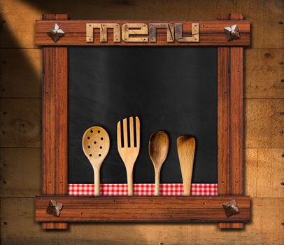 Empty blackboard with wooden frame, ancient nails and wooden written menu, four wooden kitchen utensils with red and white checkered tablecloth on wooden background