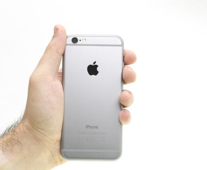 New iphone 6 holding in hand.