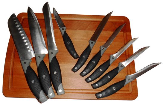 Knives on a cutting board, isolated on white.

Picture taken on November 16, 2014.