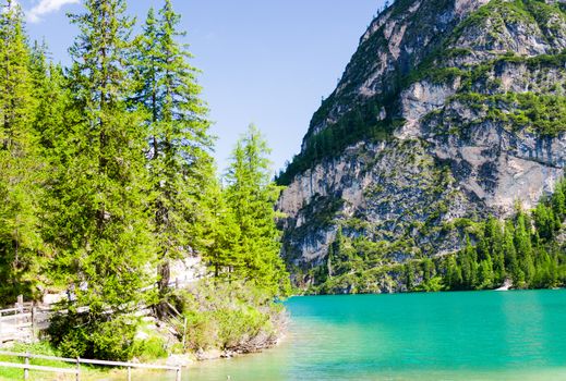 Wonderful waters of Braies lake on a summer day - Italian Alps.