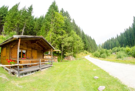 Wooden House on a Mountain landscape.