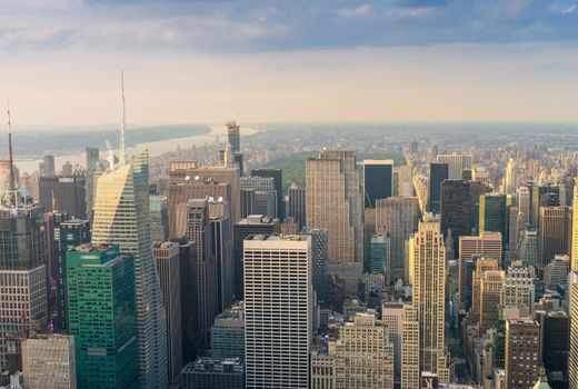 Spectacular aerial view of Manhattan. Skyscrapers at dusk.