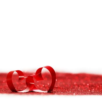 Red heart ribbon bow isolated on white background