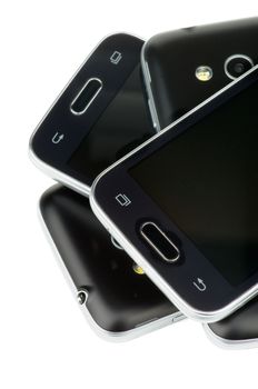 Stack of Black Smartphones with Silver Details and Buttons isolated on white background