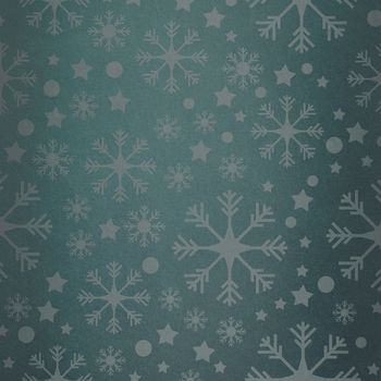 Snowflake pattern against green vignette