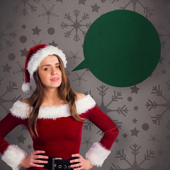 Sexy santa girl smiling at camera against grey vignette