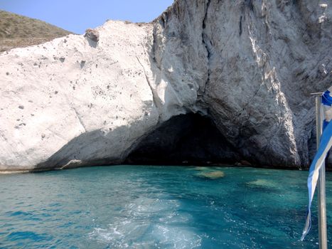 Distant view of a Small cave and crystal clear waters of Paros Island, Greece.

Picture taken on September 1, 2011.