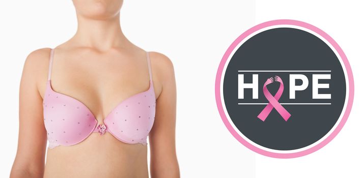 Midsection of woman in pink bra against breast cancer awareness message on poster