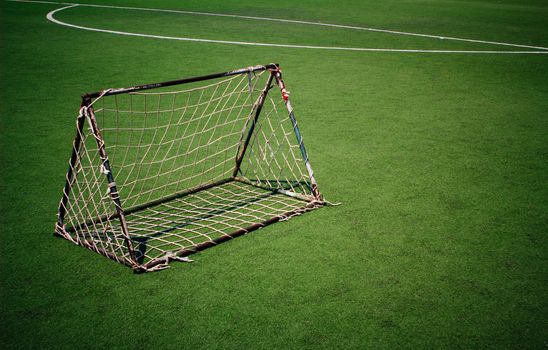 Soccer goal net in the the plastic sports field