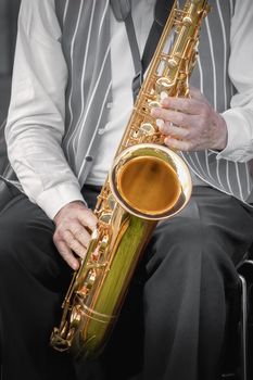 saxophonist playing his instrument in a jazz band