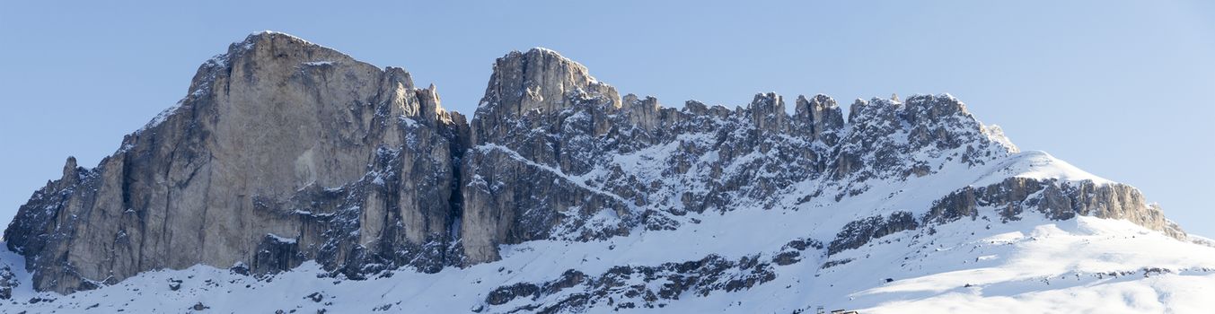 Mountain Catinaccio view from Karersee in winter season, Dolomites