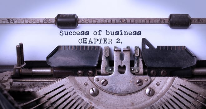 Vintage inscription made by old typewriter, success of business, chapter 2