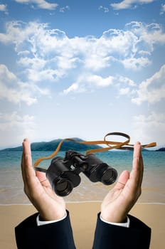  Binocular in hand at beach