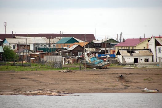 Village at Kolyma river coast outback Russia