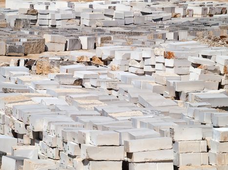 a lot of granite blocks in quarry storage