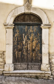 italian door in small village, Italy