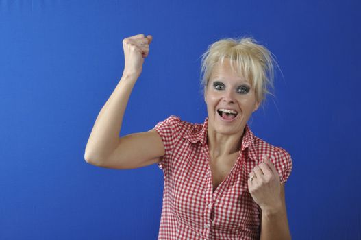 Successful woman with arms up 
