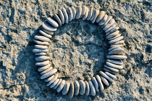 Sequence of small stones laid out in the form of a circle