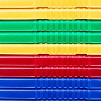 Close up of stacked plastic crates as a background