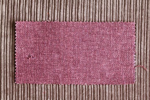 A sample piece of purple fabric