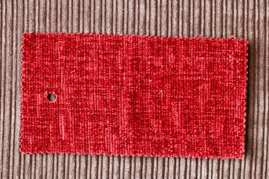 A sample piece of red fabric