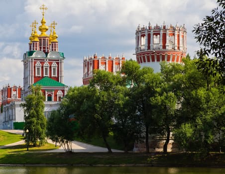 beautiful, ancient monastery on the banks of the pond