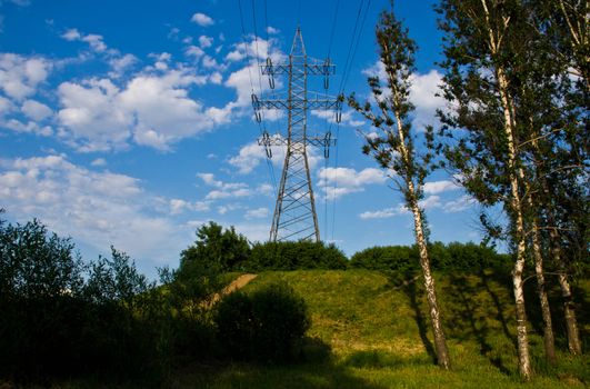 power line on the summer green hill