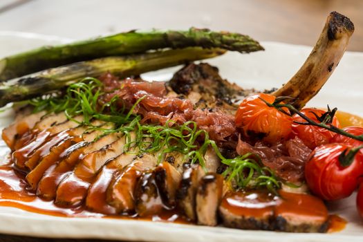 Roast pork loin with pickled onions and spices