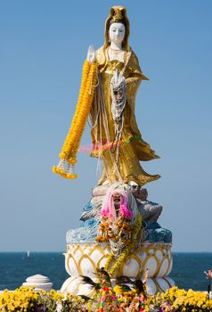 Guanyin image by the sea in Bang Saen, Chonburi Province in Thailand.