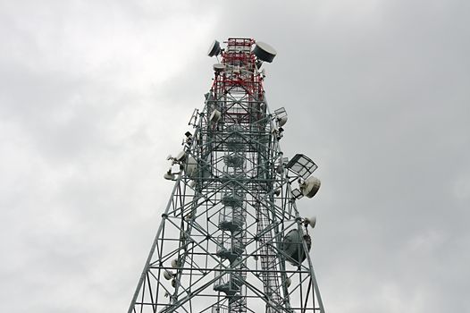 Communication transmitter tower against clear blue sky