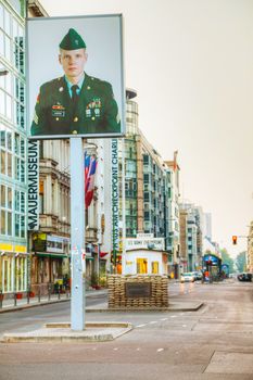 BERLIN - OCTOBER 5, 2014: Checkpoint Charlie on October 5, 2014 in Berlin, Germany. The name was given by the Western Allies to the best-known Berlin Wall crossing point between East and West Berlin during the Cold War.