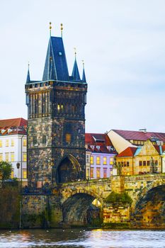 The Old Town Charles bridge tower in Prague in the evening