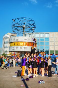 BERLIN - OCTOBER 3, 2014: Alexanderplatz on a sunny day on October 3, 2014 in Berlin, Germany. It's a large public square and transport hub in the central Mitte district of Berlin, near the Fernsehturm.