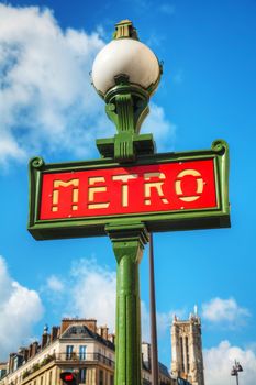 A pole with metro sign in Paris, France
