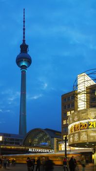 BERLIN - OCTOBER 3, 2014: Alexanderplatz at night on October 3, 2014 in Berlin, Germany. It's a large public square and transport hub in the central Mitte district of Berlin, near the Fernsehturm.