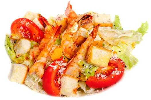 Green salad with fresh vegetables, croutons and shrimps