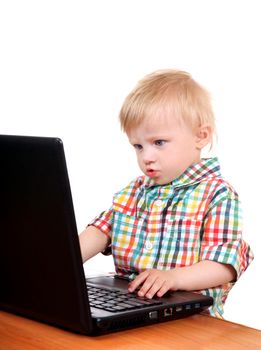 Child playing in Laptop Isolated on the White Background