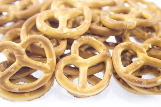 salted cookies stack on white background.