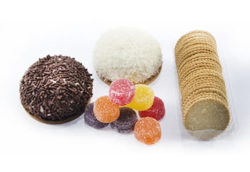 collection of delicious candies, biscuit and Cookies on a white background .