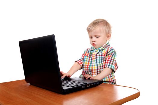Child playing in Laptop Isolated on the White Background
