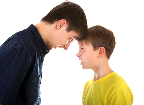 Angry Teenager and Kid looking to each other on the White Background