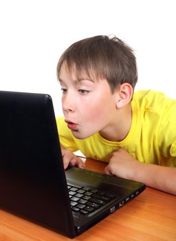 Surprised Kid with Laptop Isolated on the White Background