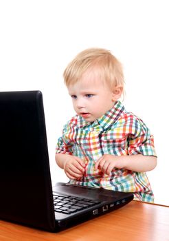 Surprised Baby Boy with Laptop Isolated on the White Background