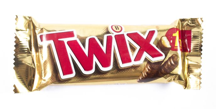 Amman, Jordan - December 5, 2014: Twix chocolate bar isolated on white background. Twix chocolate bar made by Mars, Incorporated.