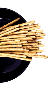 pile of pretzel sticks on white background.