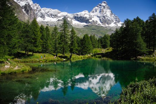 The Italian side of the Matterhorn(Cervino in Italian) viewed from the "Lago Blu"(blu lake) close to the city of Breuil-Cervinia. The Alpine crystal water create wonderful reflections