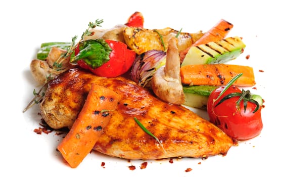 grilled chicken fillet and big pieces of vegetables