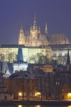 prague in winter - lesser town (mala strana) and hradcany castle at dusk